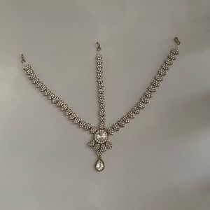 Trendy Design Matha Patti Gold Finishing with Pearl and Stone in White.